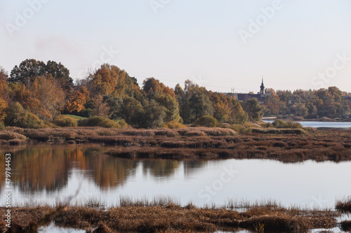 Fototapeta Naklejka Na Ścianę i Meble -  Beatufiul nature landscape view of lovely river with yello, orange colors.