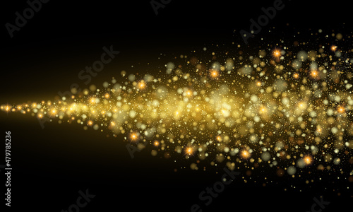 Obraz na plátne Gold sparkles on dark abstract background, golden dust stream, design element
