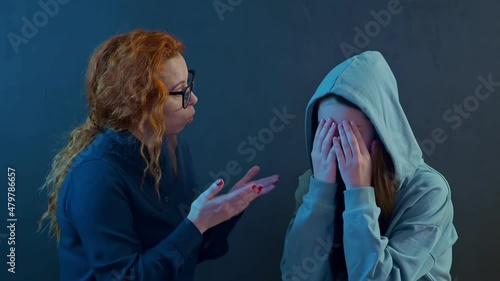 Adolescent psychology concept. Communication between mom and problem child. A conversation between a psychologist and a difficult teenager. School psychologist teacher talking to a girl. photo