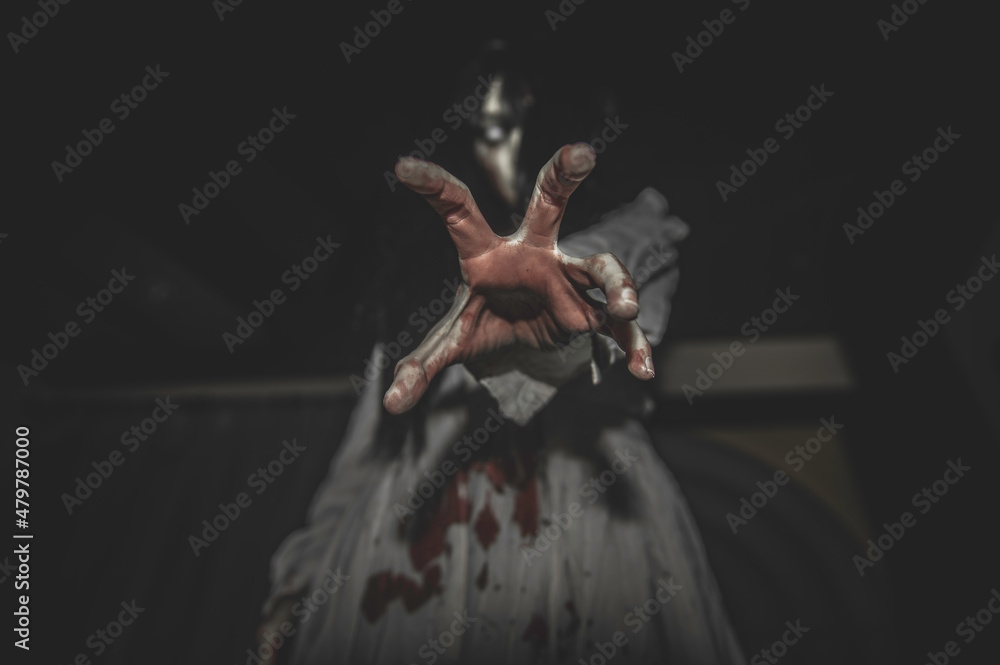 Fototapeta premium Portrait of asian woman make up ghost,Scary horror scene for background,Halloween festival concept,Ghost movies poster