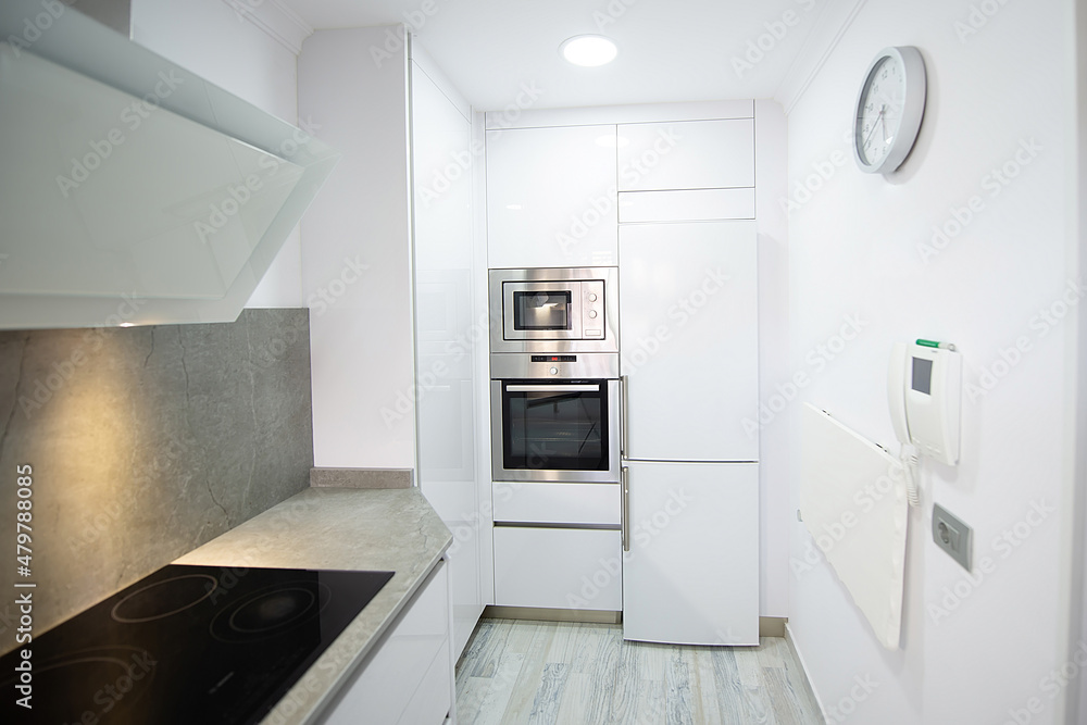 modern kitchen perfectly equipped with its appliances in a house modern kitchen perfectly equipped with its appliances in a house