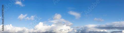 Panoramic View of Cloudscape during a cloudy blue sky sunny day. Taken on the West Coast of British Columbia, Canada.