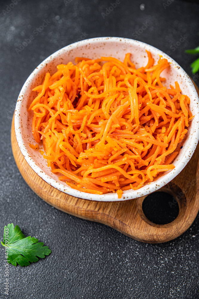 carrot salad fresh vegetable beta carotene spicy spices healthy meal food snack on the table copy space food background rustic top view carrot salad fresh vegetable beta carotene spicy spices healthy meal food snack on the table copy space food background rustic top view