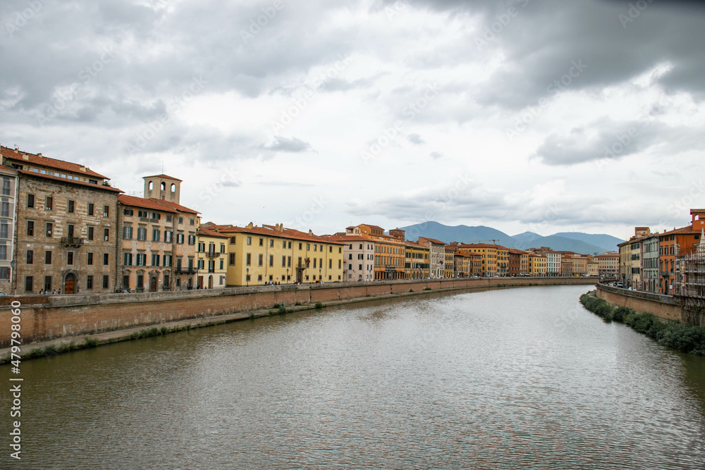 Pisa, Italy, September 2015, embankment of the Arno river with colorful houses