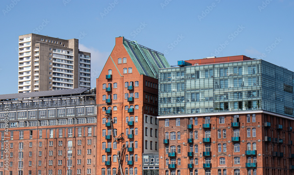 New building in Hamburg. Residential area in the city. House facade in Hamburg city. Expensive housing in the center of the city. Rent an apartment. Real estate investment. Office building.