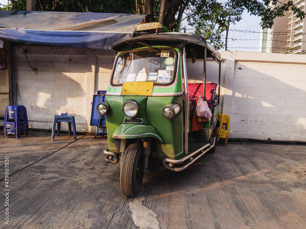 Tuk-tuk, traditional Thai taxi in Bangkok, Thailand.
