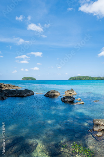 Beach  with clear water with blue sky  in tropical vacation area. Kata beach in Phuket  Thailand  a photo with copyspace.