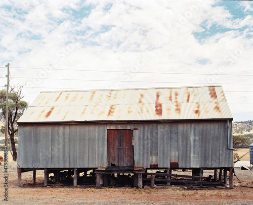 Horizontal shot of an old corrugated iron shed photo