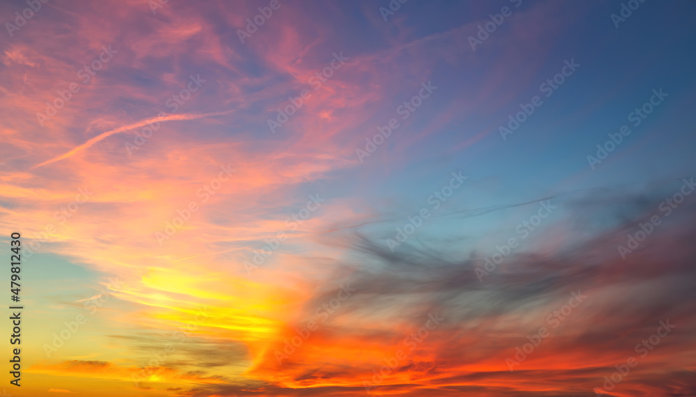 Colorful cloudy sky at sunset. Dramatic sunset sky, abstract nature background