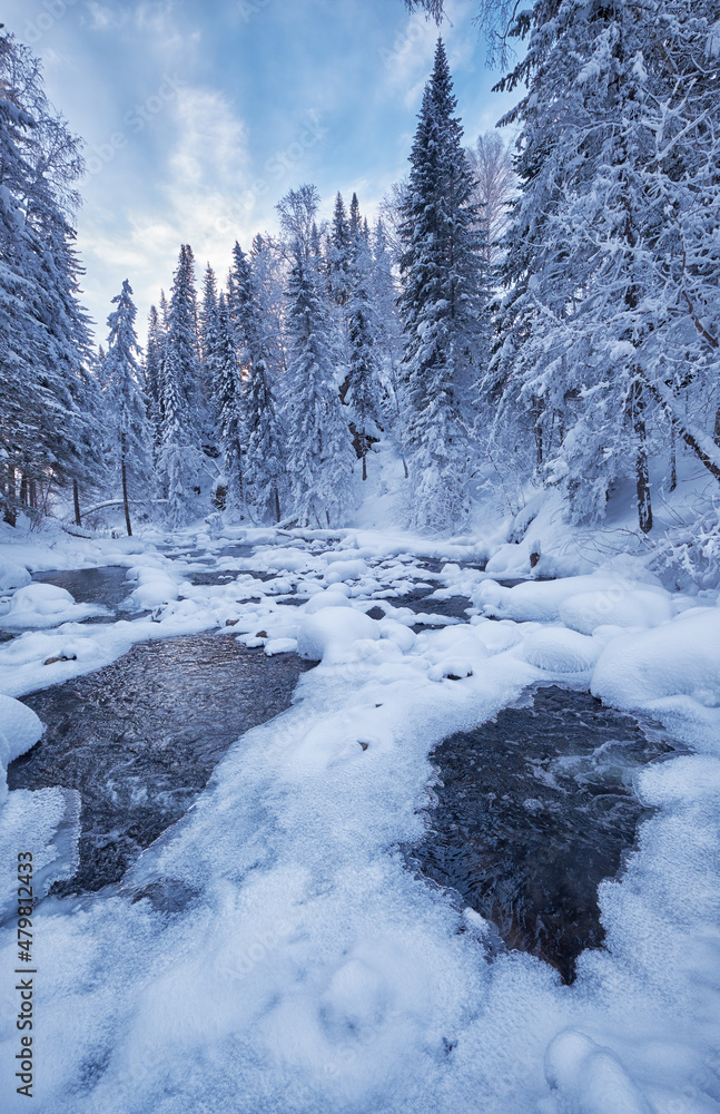 Aerial view of frozen river Pescherka near waterfall in winter. Siberia, Russia Aerial view of frozen river Pescherka near waterfall in winter. Siberia, Russia
