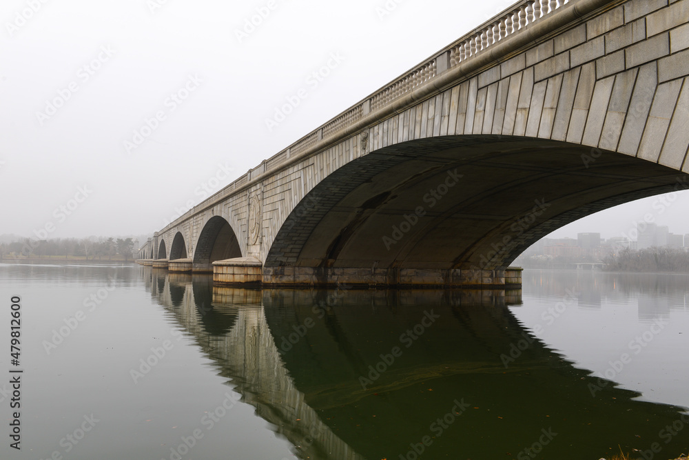 Memorial bridge and geese colony in fog - Washington dc united states Memorial bridge and geese colony in fog - Washington dc united states