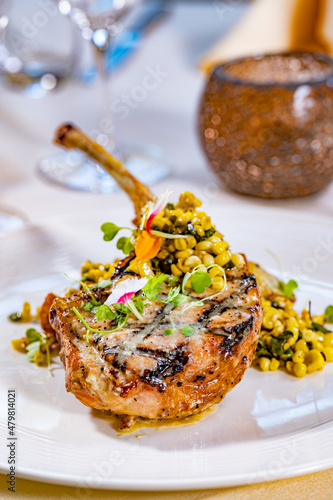 Bourbon Glazed Pork Chop with warm corn, poblano peppers and rosemary baby potatoes

