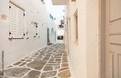 Paros island, Greece. Whitewashed building, empty narrow cobblestone street at Naousa old town © Rawf8