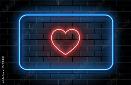 Red neon heart  with blue frame for valentines day on black brickwall background