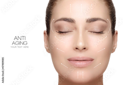 Surgery and Anti Aging Concept. Beauty Face Spa Woman with Lifting Arrows on face. Beauty portrait isolated on white photo