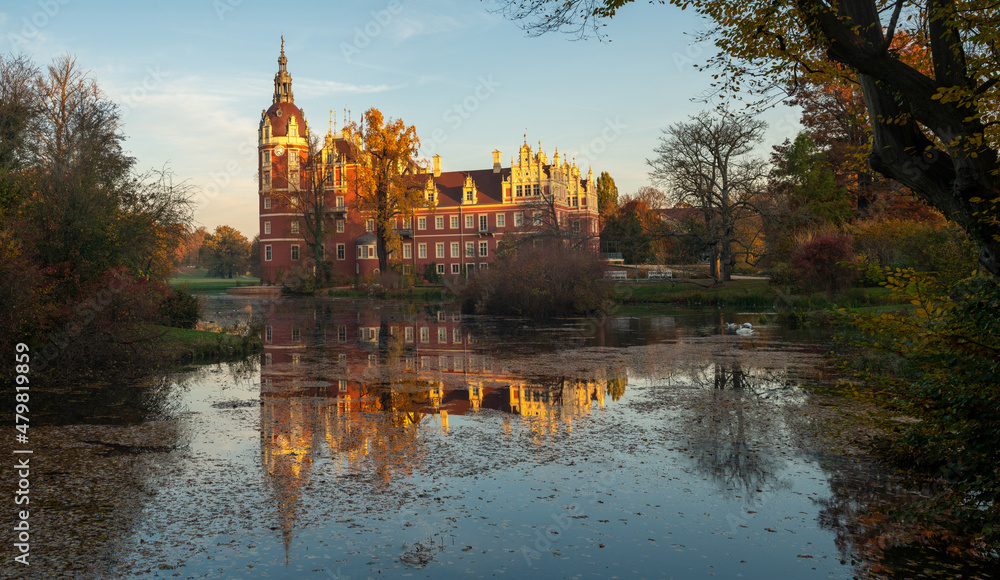 Bad Muskau Castle with a mirror reflection in the lake Bad Muskau Castle with a mirror reflection in the lake