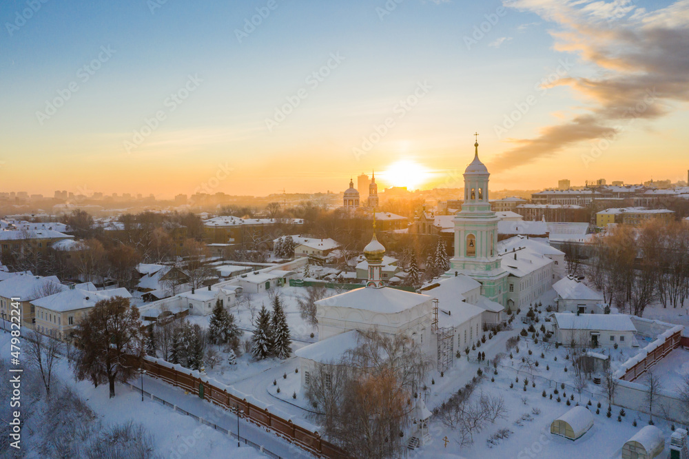 the city of Kirov and the high bank of the river Vyatka and the Alexander Grin Embankment and the rotunda on a sunny winter day