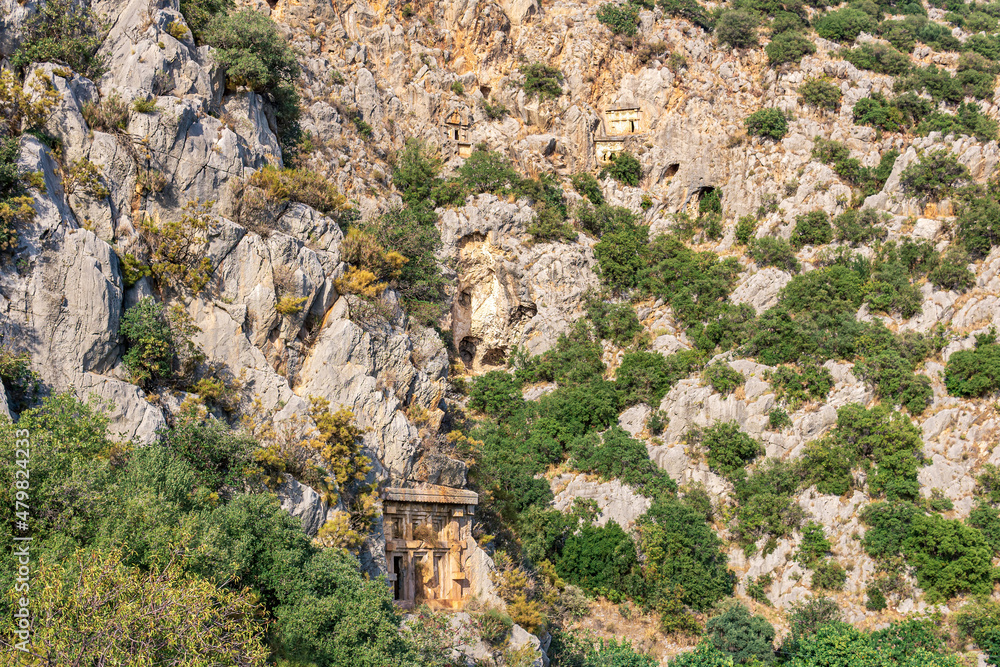 rocky necropolis with stone-cut tombs in Myra Lycian (Demre, Turkey)