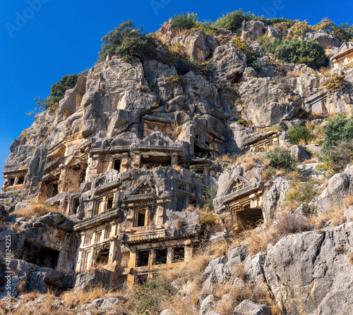 ancient tombs carved into the rocks in the ruins of Myra