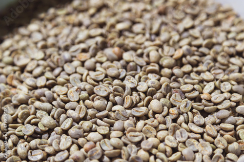 Green, unroasted coffee beans
