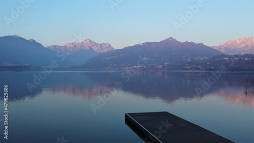 wharf at sunset with mountains
