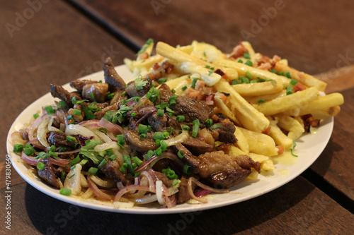 Shredded Beef with Onion, French Fries and Bacon
