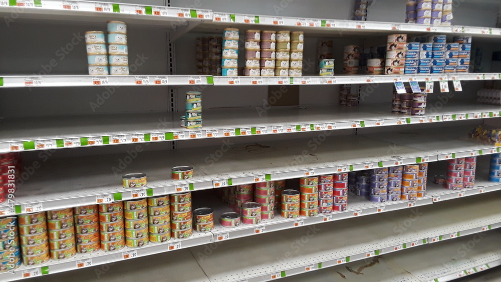 Sparse Food Canned pet cat food grocery store shelves are sparse due to supply ...