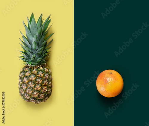 Assortment of fruits: orange and pineapple. Colorful collage. Fresh ripe healthy food. Copy space.