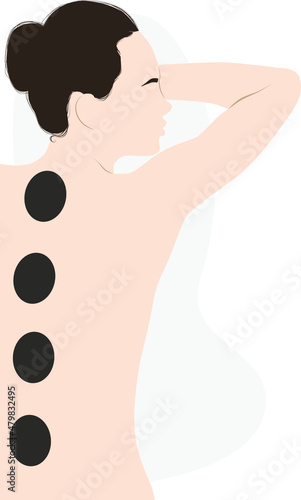Woman getting spa treatment massage with hot stones on her back. Stone treatment. Beauty treatment concept .