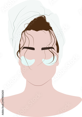 Girl with a towel on her head. Hydrogel eye patches. Cosmetic collagen eye patches against facial wrinkles. Eye patches for beauty and skin care.