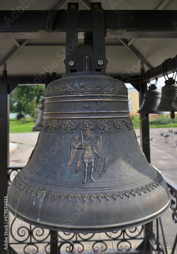 Ancient bell near Resurrection Cathedral of 17th century on right bank of Volga river in Tutayev, Yaroslavl region, Russia