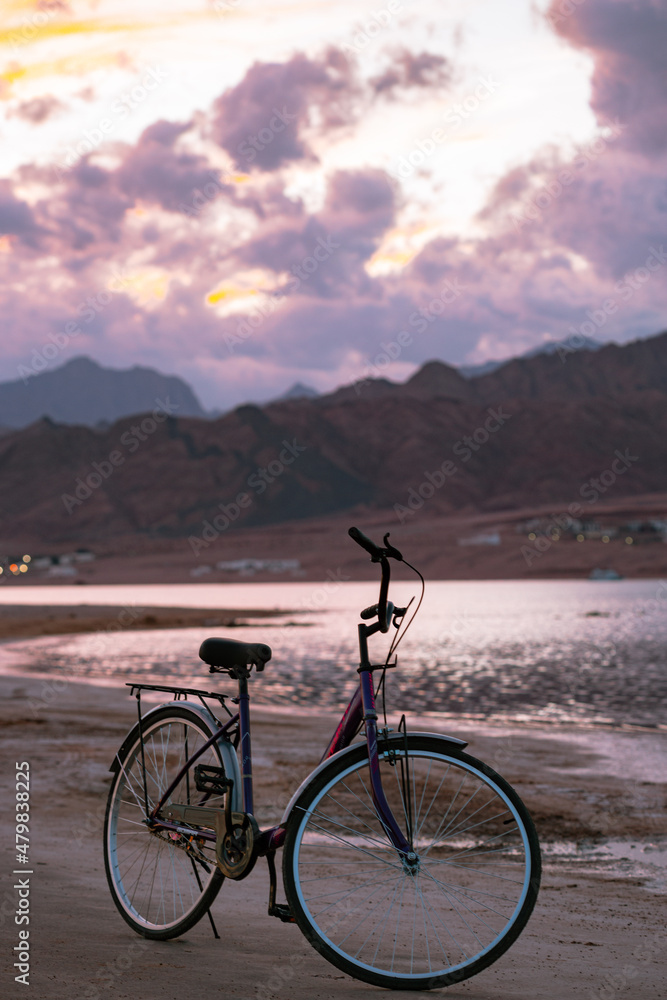 Bicycle at sunset beach, Dahab, Egypt