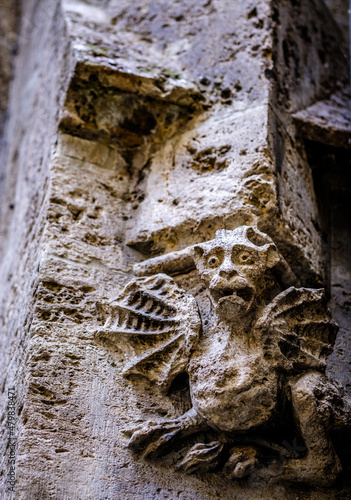 historic sculpture  gargoyle  at the city hall in munich