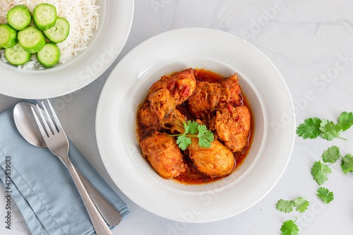 Traditional Indian Chicken Curry with Rice Top Down Close-Up Photo