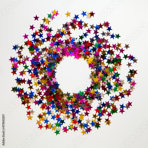 Round frame of festive holiday background with sparkle glitter decoration. Flat lay, top view. Mock up.