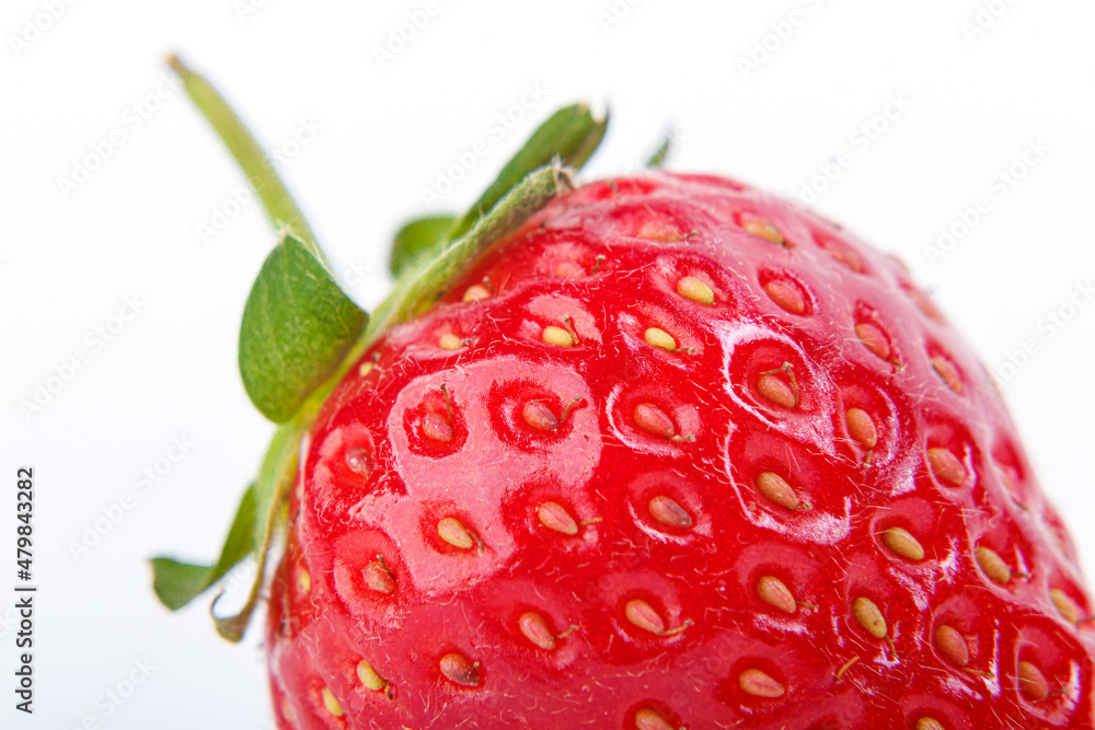beautiful and ripe red strawberries on a white background beautiful and ripe red strawberries on a white background