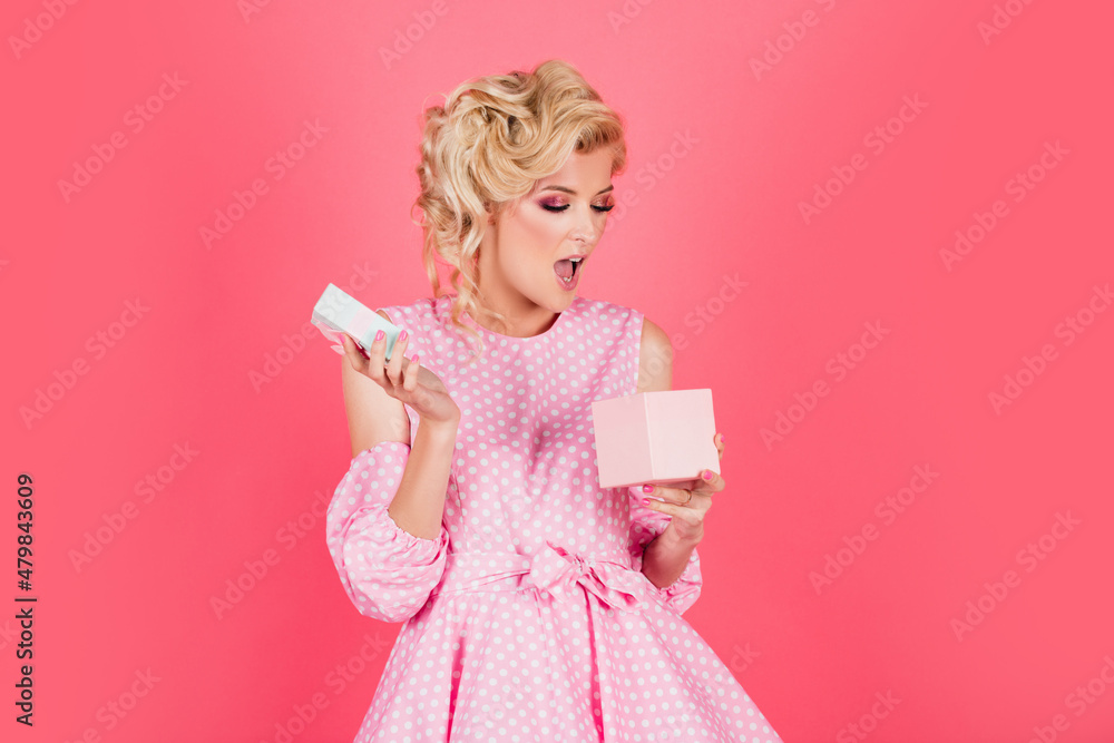 Valentines or birthday gifts. Portrait of surprised woman with gift. Holidays, celebration and womens day concept. Excited girl with presents, isolated background. Valentines or birthday gifts. Portrait of surprised woman with gift. Holidays, celebration and womens day concept. Excited girl with presents, isolated background.