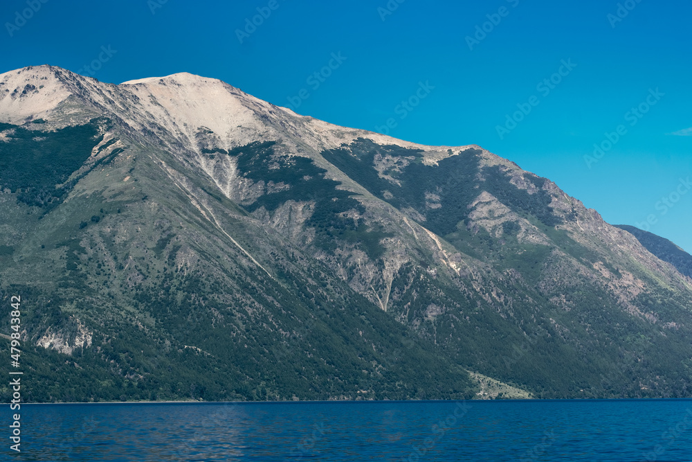 Naklejka premium High Mountain over the lake