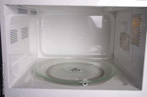 an open microwave oven. Microwave view from inside