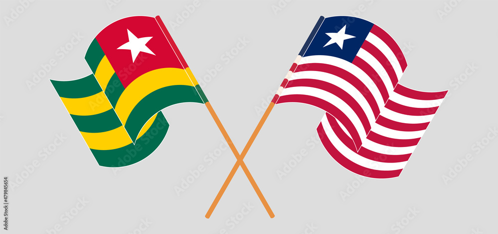 Crossed and waving flags of Togo and Liberia Crossed and waving flags of Togo and Liberia