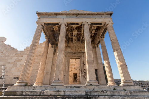 Athens, Greece. The Erechtheion, or Temple of Athena Polias, an ancient Greek Ionic temple-telesterion on the north side of the Acropolis photo