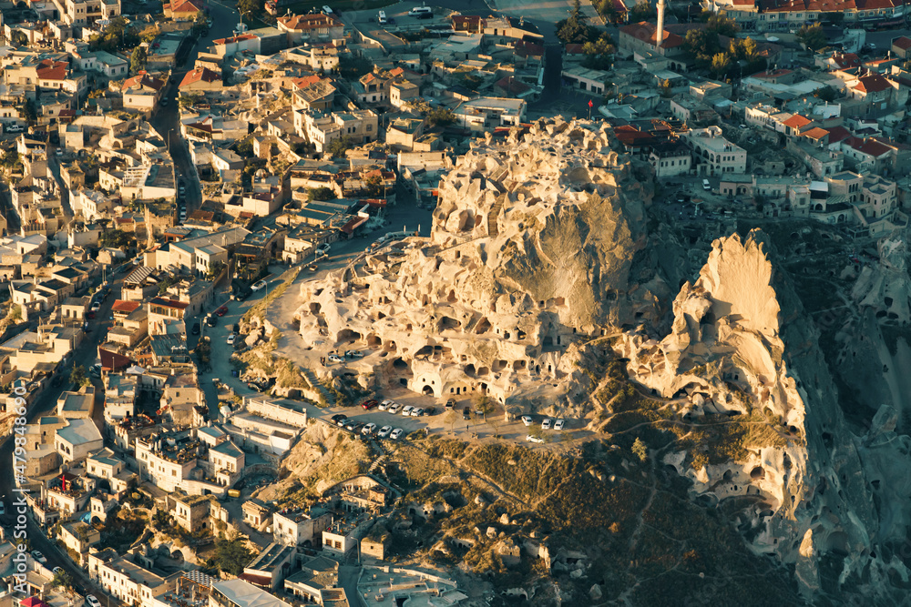Aerial top view of Uchisar castle in the sunrise. Cappadocia. Nevsehir Province. Turkey