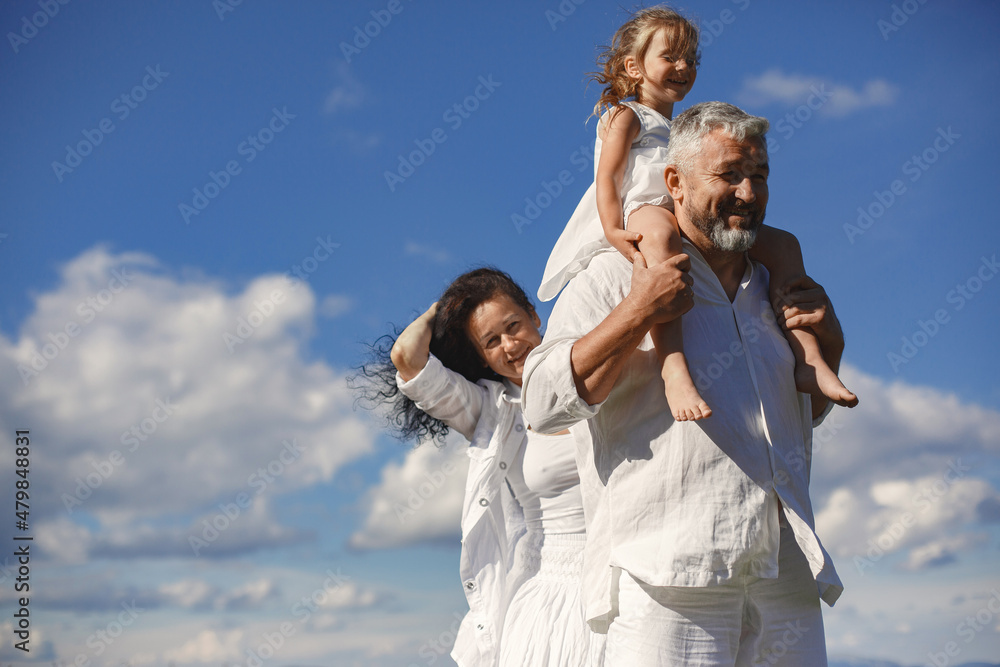 Grandparents in summer mountains with granddaughter Grandparents in summer mountains with granddaughter