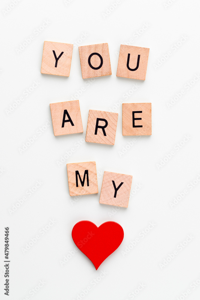 Wooden blocks in a pastel board with the text end heart. Wooden blocks in a pastel board with the text end heart.