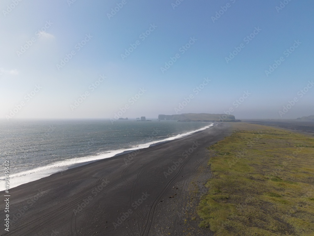 Aerial drone landscape of Reynisfjara black sand beach in south Iceland