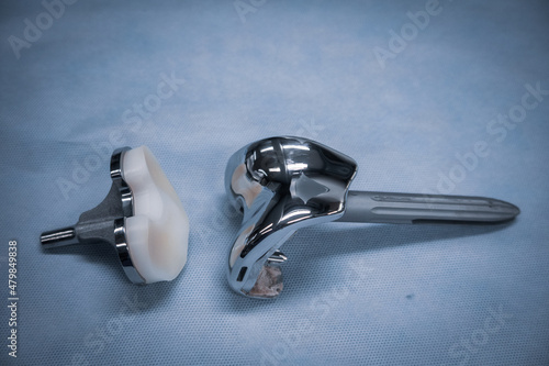  complete explanted knee prosthesis consisting of distal and proximal parts