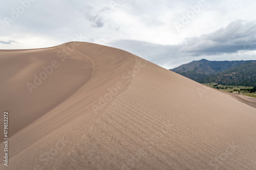 The ridge of a sand dune at the national park in Colorado © Keith J Sfinx