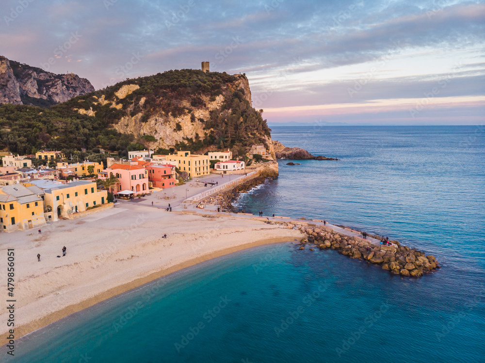 Aerial view of the beach of Varigotti during blue hour. Liguria, Italy