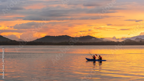 Tableau sur toile Kayak in nice view at a sunset time.