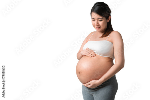 Young pregnant asian woman touching her belly, she holding baby in pregnant belly isolate on white background, Maternity prenatal care and woman pregnancy concept.